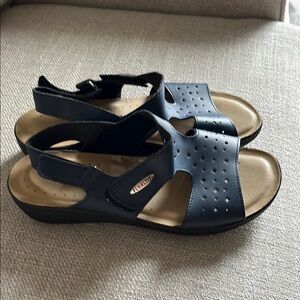 Blue and Tan Flat Sandals with Open Toe Design and Adjustable Straps